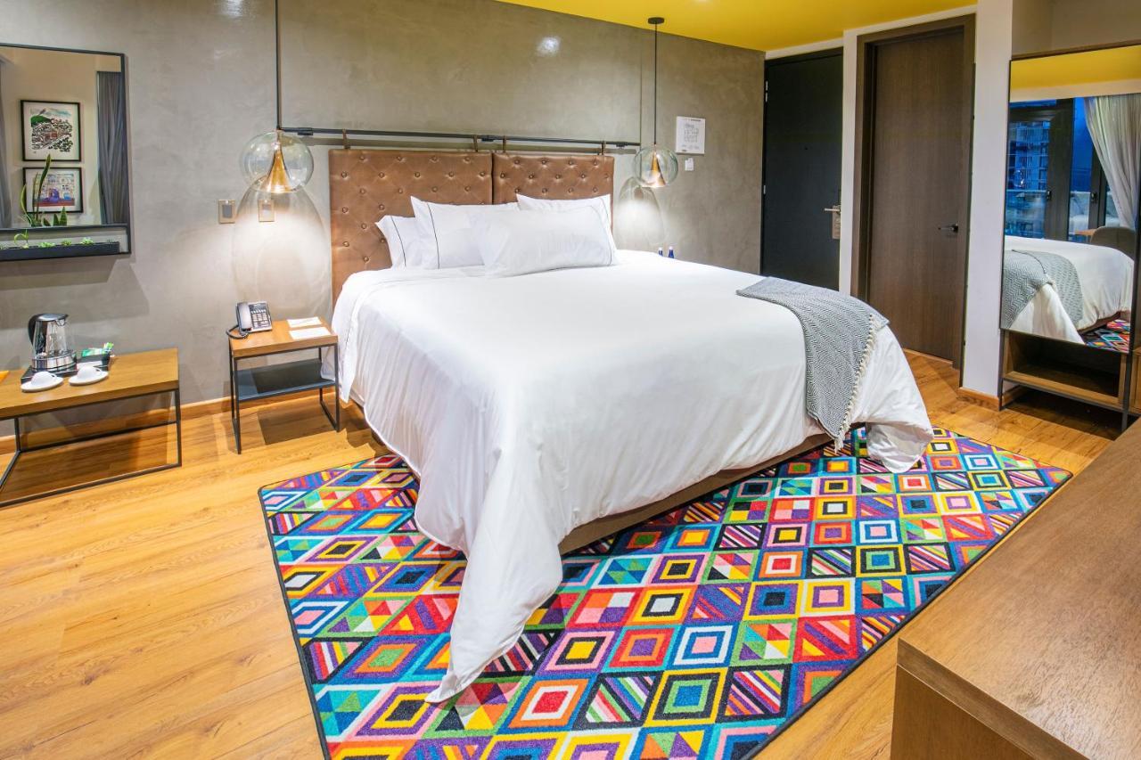 Hotel V1501 Pasto Exteriör bild A carpet in a bedroom