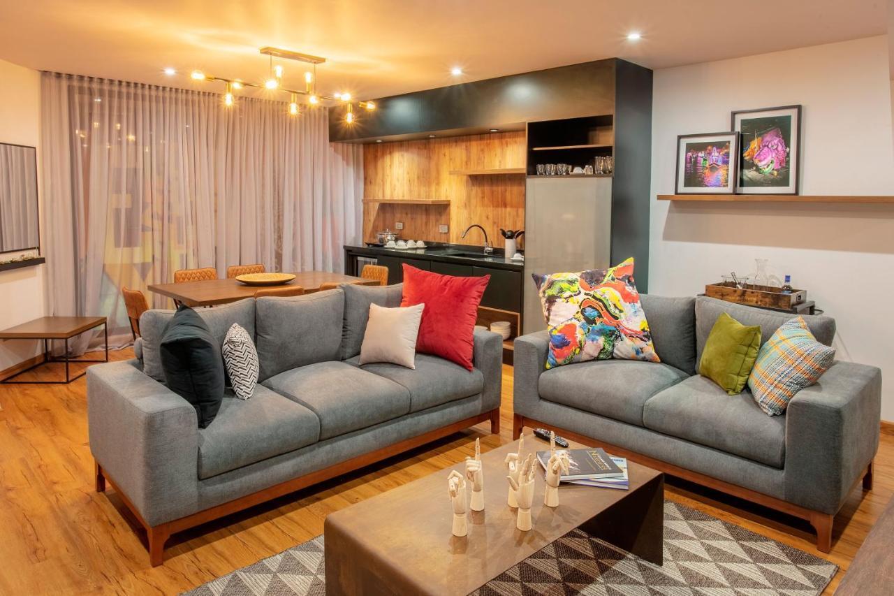 Hotel V1501 Pasto Exteriör bild A living room with a sofa