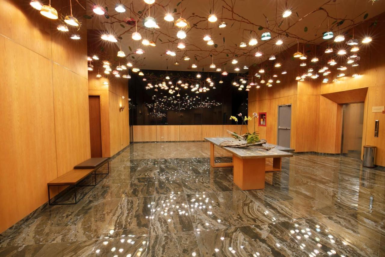Hotel V1501 Pasto Exteriör bild The lobby of the National Museum of Singapore
